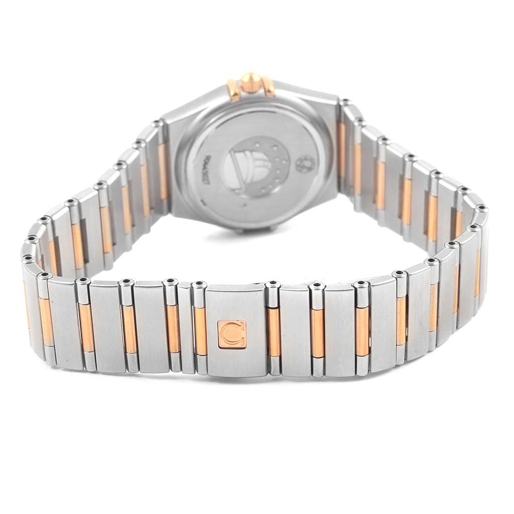 The image shows the back and band of the Omega 1358.60.00 Women's Steel and Gold (two tone) Brown Dial 1358.60.00 Women's Steel and Gold (two tone) Brown Dial Constellation 95 Steel Rose Gold Diamond Watch 1358.60.00 Unworn model.