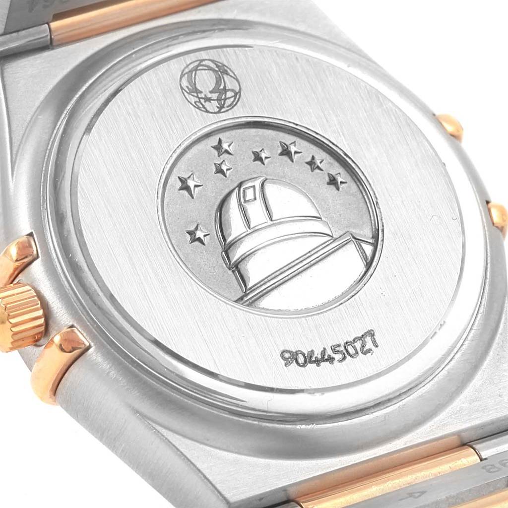 The image shows the back of the Omega 1358.60.00 Women's Steel and Gold (two tone) Brown Dial 1358.60.00 Women's Steel and Gold (two tone) Brown Dial Constellation 95 Steel Rose Gold Diamond Watch 1358.60.00 model, featuring the engraved observatory logo.