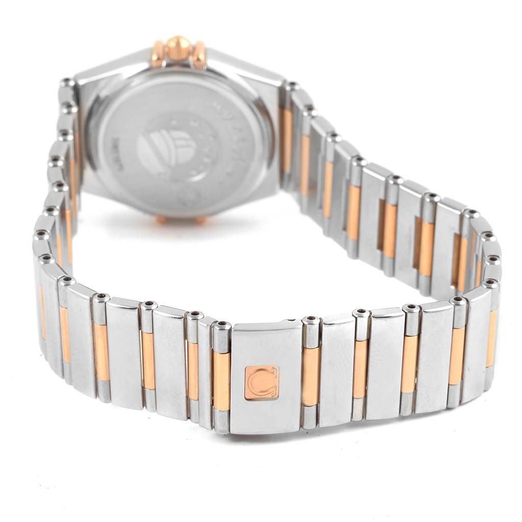 The Omega 1465.79.00 Women
s Steel and Gold (two tone) Mother of Pearl Dial 1465.79.00 Women
s Steel and Gold (two tone) Mother of Pearl Dial Constellation Iris My Choice Steel Rose Gold Ladies Watch 1373.79 is shown from the back, highlighting its band and clasp.