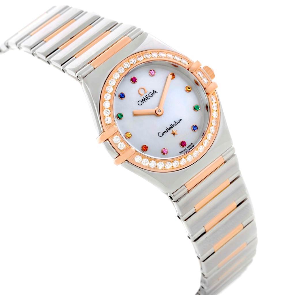 The Omega 1465.79.00 Women
s Steel and Gold (two tone) Mother of Pearl Dial 1465.79.00 Women
s Steel and Gold (two tone) Mother of Pearl Dial Constellation Iris My Choice Steel Rose Gold Ladies Watch 1373.79 is shown from an angle highlighting its face and partial band.