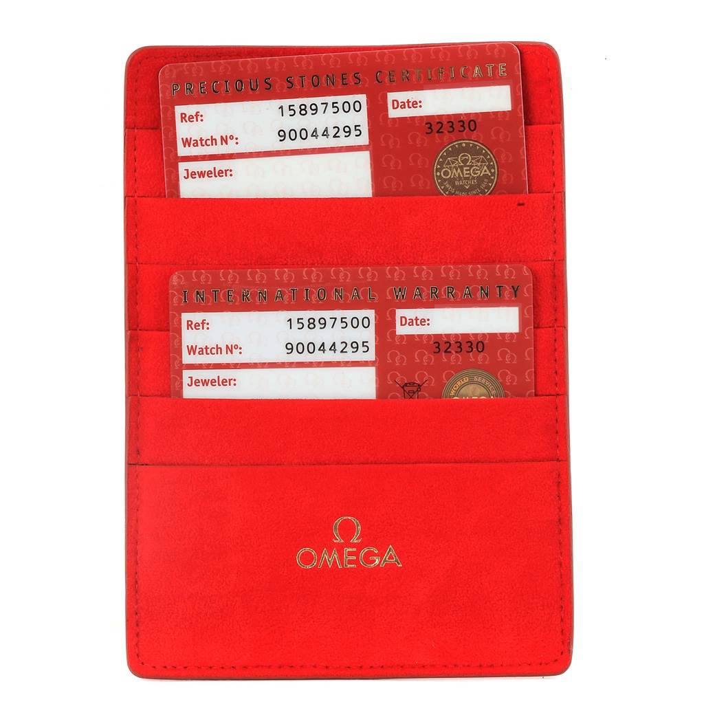 The image shows the warranty and certificate cards of the Omega 1589.75.00 Women's Stainless Steel Mother of Pearl Dial 1589.75.00 Women's Stainless Steel Mother of Pearl Dial Constellation MOP Diamond Steel Ladies Watch 1589.75.00.