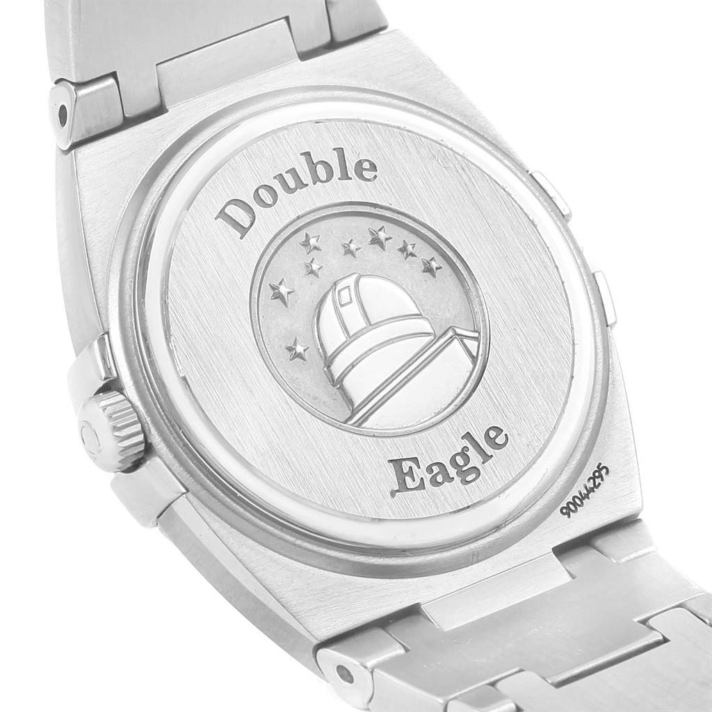 The image shows the back casing and part of the bracelet of the Omega 1589.75.00 Women's Stainless Steel Mother of Pearl Dial 1589.75.00 Women's Stainless Steel Mother of Pearl Dial Constellation MOP Diamond Steel Ladies Watch 1589.75.00 Unworn model.