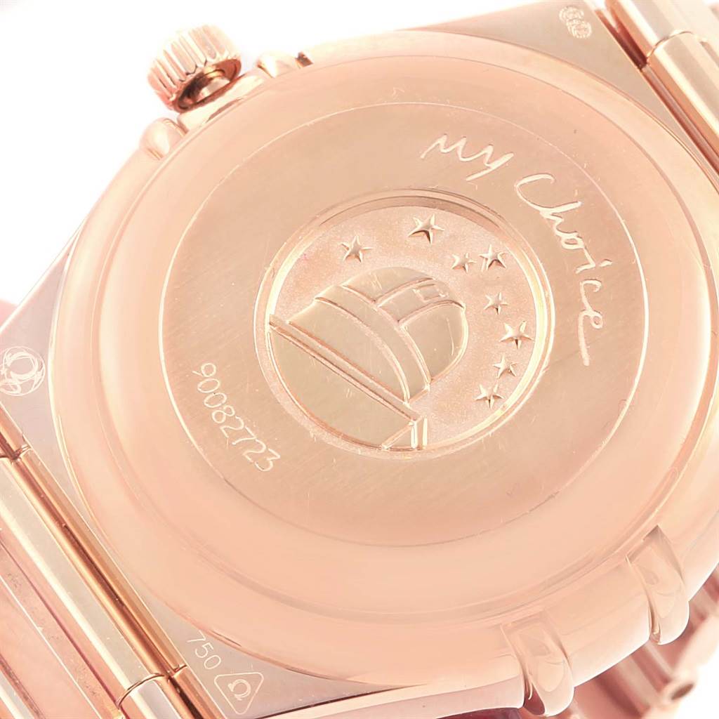 The image shows the back view of the Omega 1140.79.00 Women
s Rose Gold Mother of Pearl Dial 1140.79.00 Women
s Rose Gold Mother of Pearl Dial Constellation Iris My Choice Rose Gold Ladies Watch 1140.79, highlighting the case back and crown.