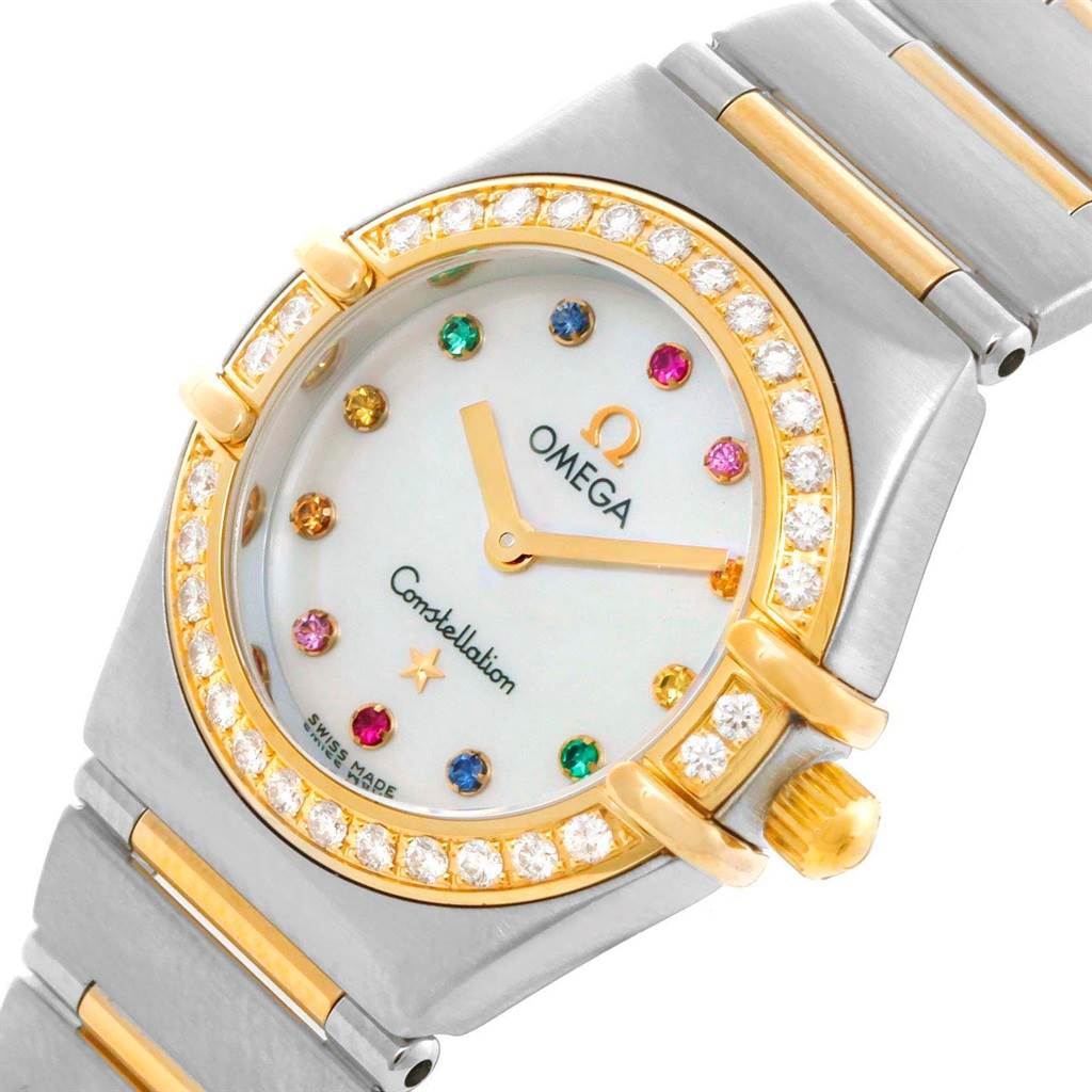 This image shows a close-up, angled view of the Omega 1365.79.00 Women
s Steel and Gold (two tone) Mother of Pearl Dial 1365.79.00 Women
s Steel and Gold (two tone) Mother of Pearl Dial Constellation Iris Steel Yellow Gold Multi Stone Watch 1365.79.00, highlighting its bezel, dial, and bracelet.