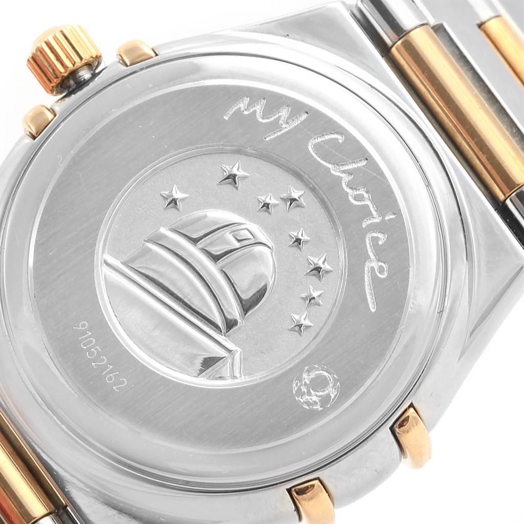 The image shows the back case of the Omega 1365.79.00 Women
s Steel and Gold (two tone) Mother of Pearl Dial 1365.79.00 Women
s Steel and Gold (two tone) Mother of Pearl Dial Constellation Iris Steel Yellow Gold Multi Stone Watch 1365.79.00 model.