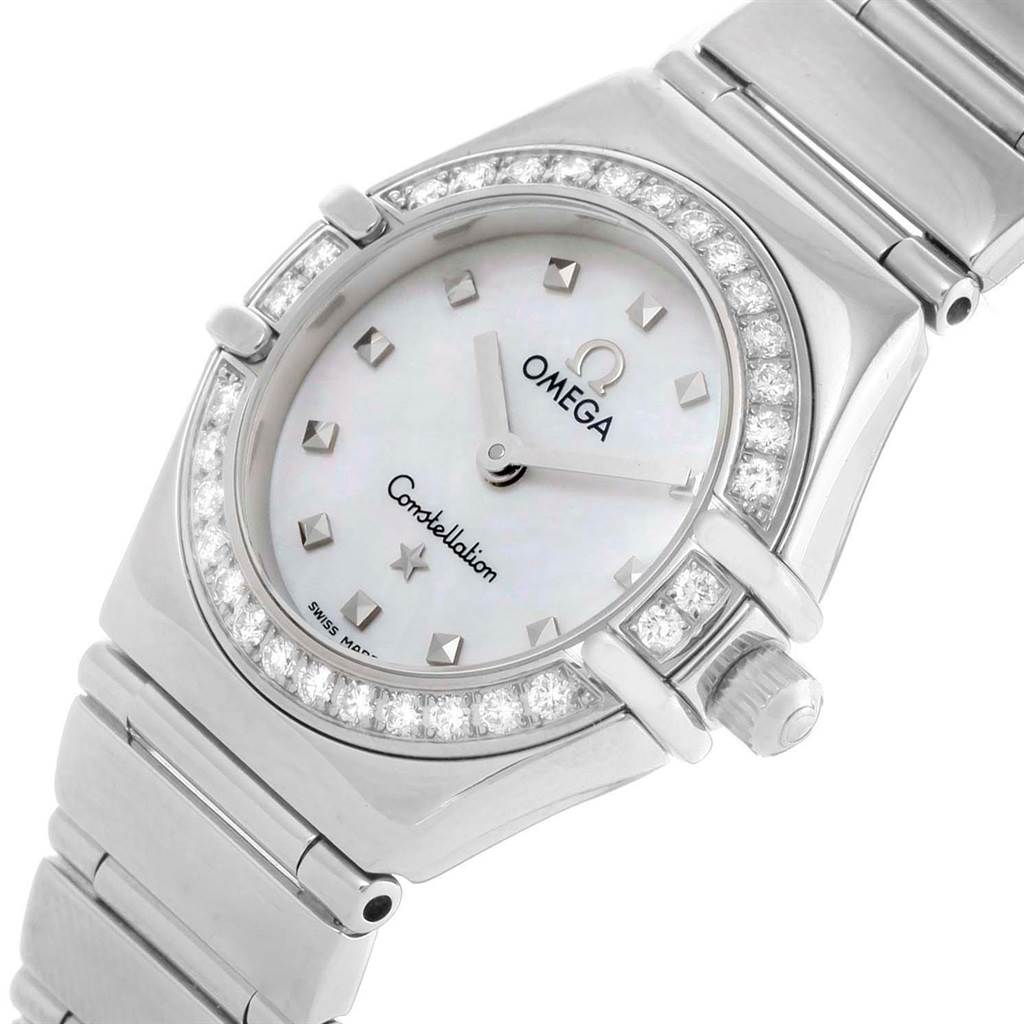 This image shows an Omega 1465.71.00 Women
s Stainless Steel Mother of Pearl Dial 1465.71.00 Women
s Stainless Steel Mother of Pearl Dial Constellation My Choice Mini Diamond Steel Watch 1465.71.00 from a close-up angle, highlighting the dial, bezel, and part of the bracelet.