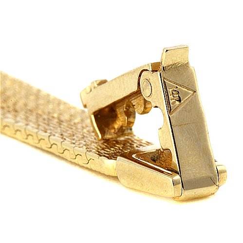 The image shows a detailed, close-up view of the clasp mechanism of the Omega H7892-R Women's Yellow Gold Champagne Dial H7892-R Women's Yellow Gold Champagne Dial Vintage Ladies 14k Yellow Gold Diamond Watch.