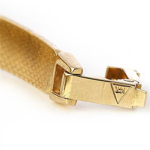 This image shows a close-up of the clasp of the Vintage Ladies 14k Yellow Gold Diamond Watch by Omega H7892-R Women's Yellow Gold Champagne Dial H7892-R Women's Yellow Gold Champagne Dial.