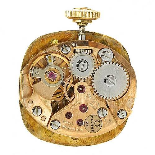 This image shows the inner mechanism of the Vintage Ladies 14k Yellow Gold Diamond Watch by Omega H7892-R Women's Yellow Gold Champagne Dial H7892-R Women's Yellow Gold Champagne Dial, viewed from the back.