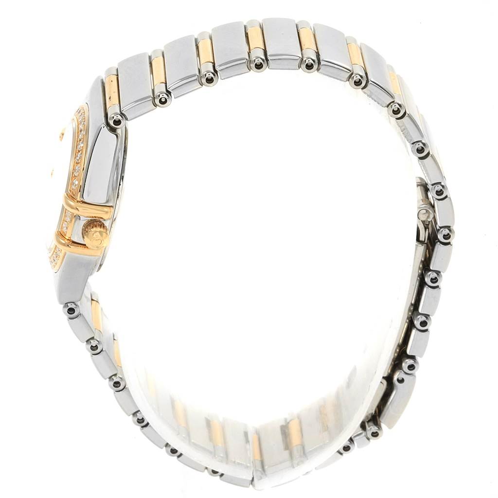 The image shows a side view of an Omega 1365.79.00 Women
s Steel and Gold (two tone) Mother of Pearl Dial 1365.79.00 Women
s Steel and Gold (two tone) Mother of Pearl Dial Constellation Iris Steel Yellow Gold Multi Stone Watch 1365.79.00, highlighting the band and crown.