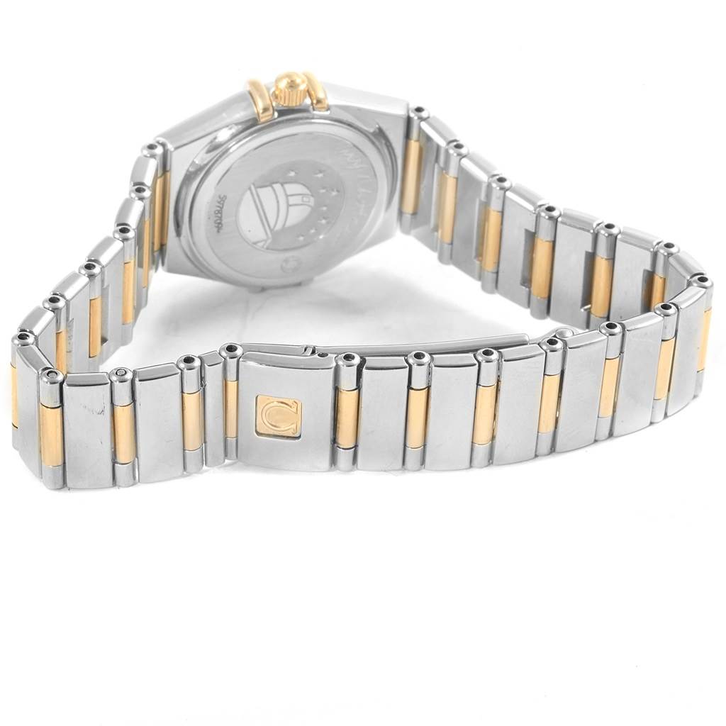 The image shows the back and band of the Omega 1365.79.00 Women
s Steel and Gold (two tone) Mother of Pearl Dial 1365.79.00 Women
s Steel and Gold (two tone) Mother of Pearl Dial Constellation Iris Steel Yellow Gold Multi Stone Watch model 1365.79.00.