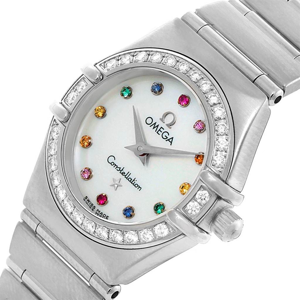 The image shows an angled view of the Omega 1476.79.00 Women's Stainless Steel Mother of Pearl Dial 1476.79.00 Women's Stainless Steel Mother of Pearl Dial Constellation Iris Rainbow Multi Stone Watch 1476.79.00, highlighting the dial and part of the bracelet.