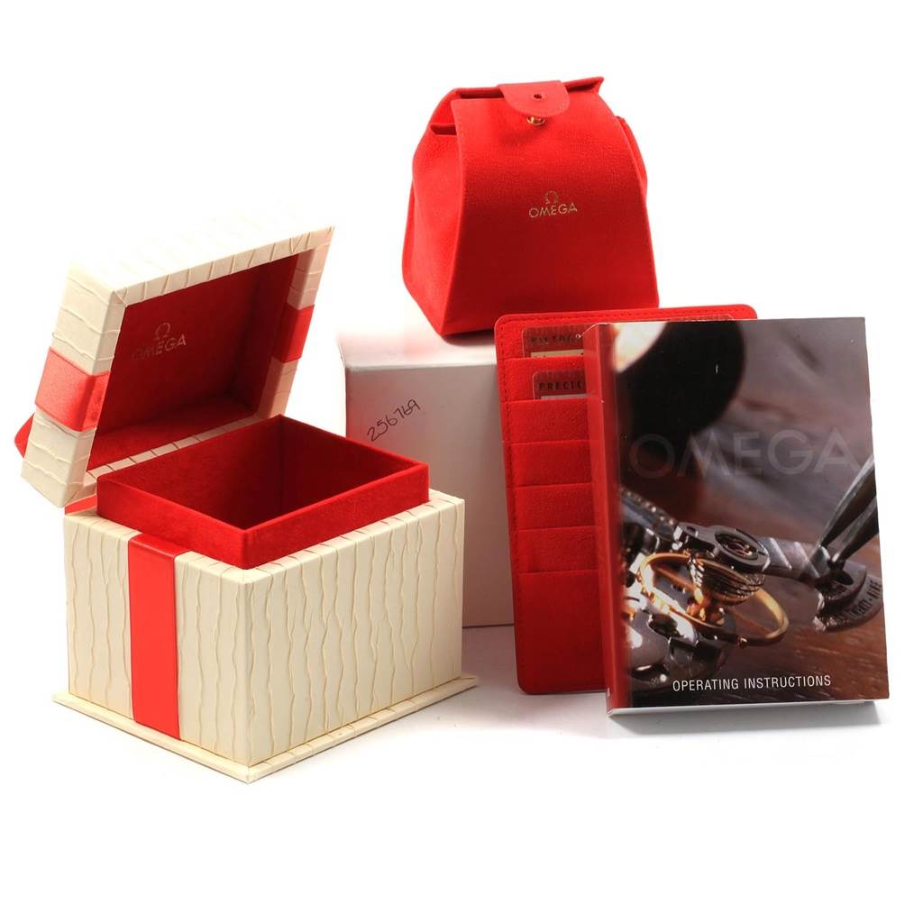 The image shows the box, interior, pouch, operational instructions, and warranty cards for the Omega 1476.79.00 Women's Stainless Steel Mother of Pearl Dial 1476.79.00 Women's Stainless Steel Mother of Pearl Dial Constellation Iris Rainbow Multi Stone Watch 1476.79.00.