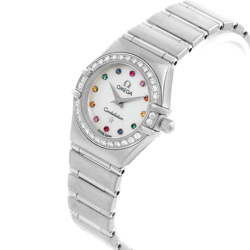 The image shows the Omega 1476.79.00 Women's Stainless Steel Mother of Pearl Dial 1476.79.00 Women's Stainless Steel Mother of Pearl Dial Constellation Iris Rainbow Multi Stone Watch 1476.79.00 from an angled side view, displaying its face and band.