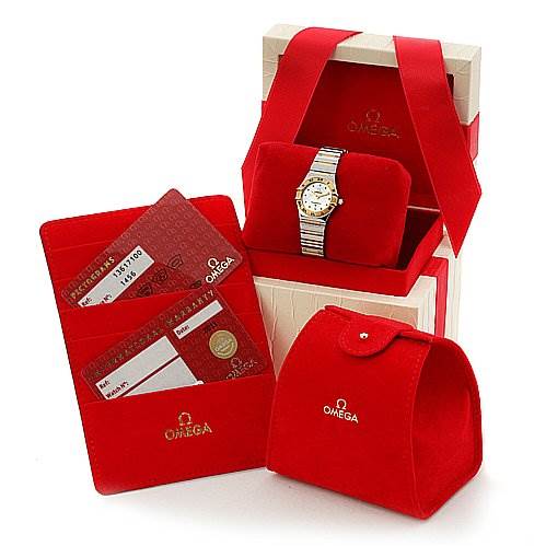 The image shows an Omega 13617100 OR 1361.   71.   00 Women's Yellow Gold Mother of Pearl Dial 13617100 OR 1361.   71.   00 Women's Yellow Gold Mother of Pearl Dial Constellation My Choice Mini 13617100 watch with its box, red pouch, and certificates.