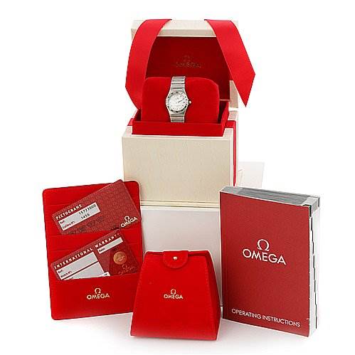The image shows an Omega 15723000 OR 1572.   30.   00 Women's Stainless Steel Silver Dial 15723000 OR 1572.   30.   00 Women's Stainless Steel Silver Dial Constellation Small Quartz New Ladies 15723000 Watch and its accessories, including packaging, cards, and an instruction booklet.
