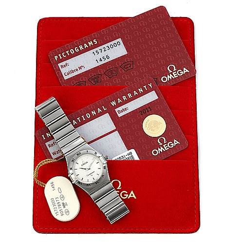 The image shows an Omega 15723000 OR 1572.   30.   00 Women's Stainless Steel Silver Dial 15723000 OR 1572.   30.   00 Women's Stainless Steel Silver Dial Constellation Small Quartz New Ladies 15723000 watch along with its warranty card and red Omega 15723000 OR 1572.   30.   00 Women's Stainless Steel Silver Dial 15723000 OR 1572.   30.   00 Women's Stainless Steel Silver Dial holder.