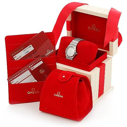 The image shows an Omega 15717100 OR 1571.   71.   00 Women
s Stainless Steel Mother of Pearl Dial 15717100 OR 1571.   71.   00 Women
s Stainless Steel Mother of Pearl Dial Constellation Small Quartz New Ladies 15717100 Watch with its box, warranty cards, and a red pouch at an angle.