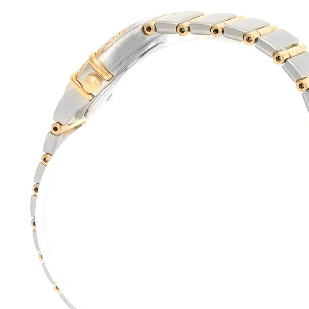 This image shows a side angle of the Omega 1267.75.00 Women
s Steel and Gold (two tone) Mother of Pearl Dial 1267.75.00 Women
s Steel and Gold (two tone) Mother of Pearl Dial Constellation Mini Mother of Pearl Diamond Watch 1267.75.00, focusing on the bracelet and clasp.