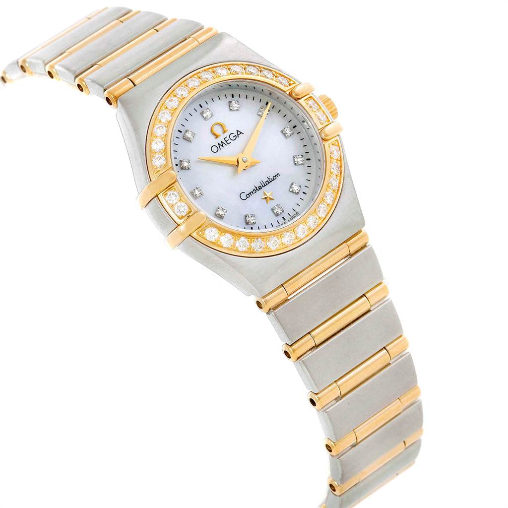 The Omega 1267.75.00 Women's Steel and Gold (two tone) Mother of Pearl Dial 1267.75.00 Women's Steel and Gold (two tone) Mother of Pearl Dial Constellation Mini Mother of Pearl Diamond Watch 1267.75.00 is shown at an angle highlighting its face, bezel, and bracelet.