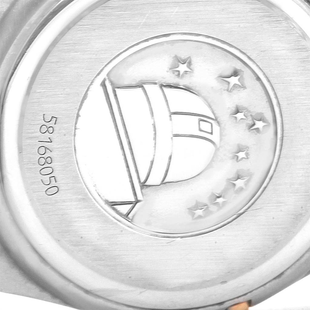 This image shows the back case of the Omega 1267.75.00 Women's Steel and Gold (two tone) Mother of Pearl Dial 1267.75.00 Women's Steel and Gold (two tone) Mother of Pearl Dial Constellation Mini Mother of Pearl Diamond Watch 1267.75.00 model, featuring an observatory engraving.