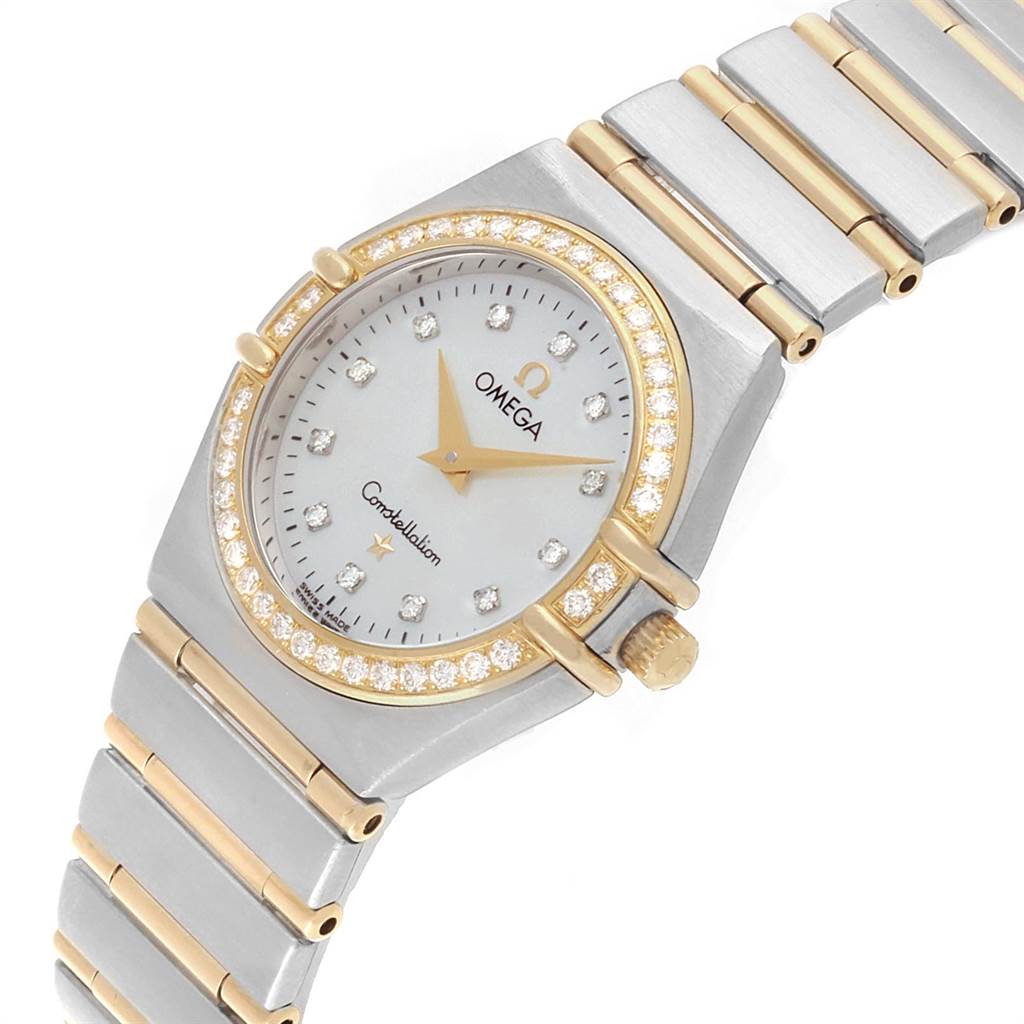 The image shows an angled view of the Omega 1277.75.00 Women's Steel and Gold (two tone) Mother of Pearl Dial 1277.75.00 Women's Steel and Gold (two tone) Mother of Pearl Dial Constellation 95 Steel Yellow Gold MOP Diamond Watch 1277.75.00, highlighting face, bezel, crown, and part of the bracelet.