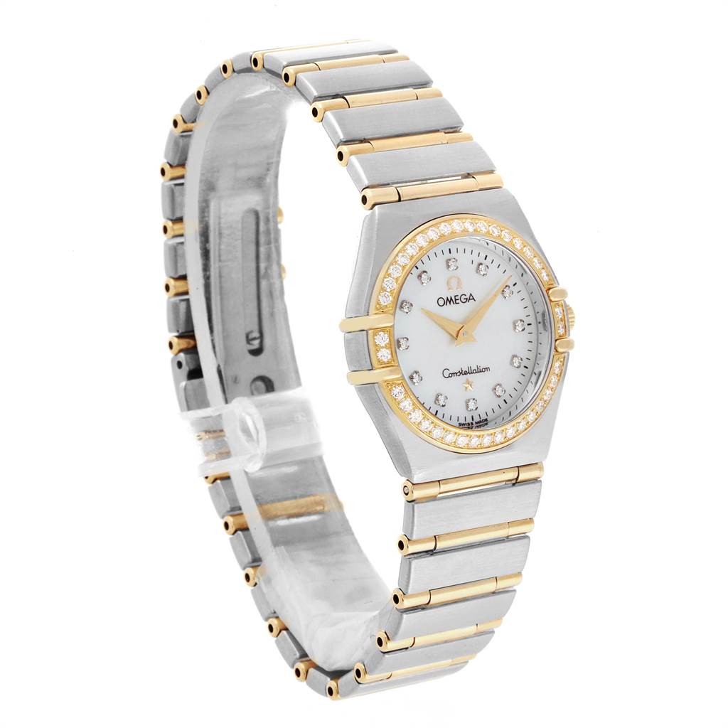 The Omega 1277.75.00 Women's Steel and Gold (two tone) Mother of Pearl Dial 1277.75.00 Women's Steel and Gold (two tone) Mother of Pearl Dial Constellation 95 Steel Yellow Gold MOP Diamond Watch 1277.75.00 is shown at an angled view, displaying its face and bracelet.
