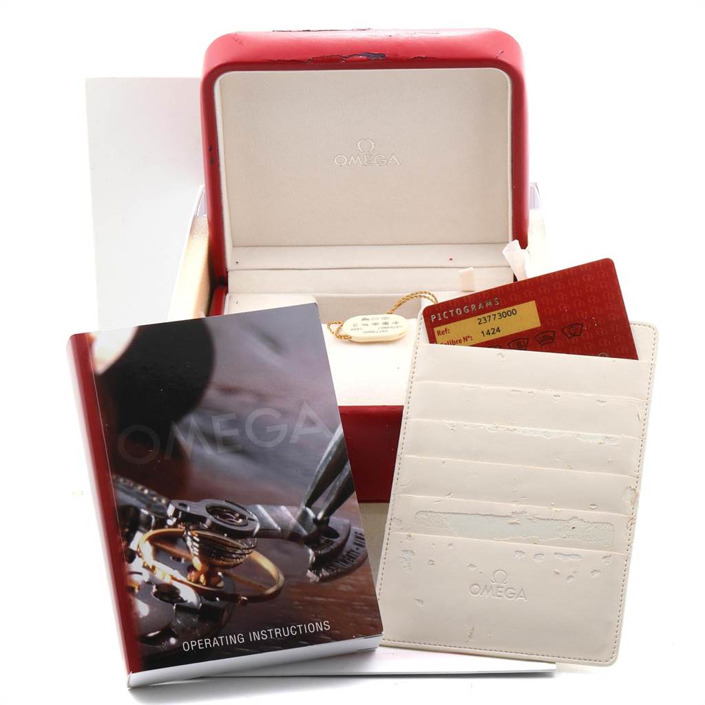 The image shows the Omega 2377.30.00 Women's Steel and Gold (two tone) Silver Dial 2377.30.00 Women's Steel and Gold (two tone) Silver Dial Seamaster Aqua Terra Steel Yellow Gold Ladies Watch 2377.30.00 packaging, manual, and warranty card.