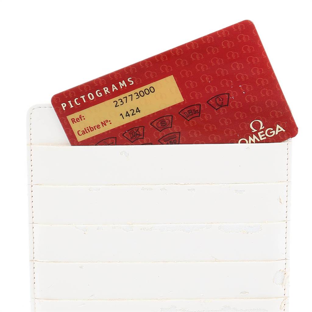 The image shows the Pictograms card, partially inserted into a white wallet, for the Omega 2377.30.00 Women's Steel and Gold (two tone) Silver Dial 2377.30.00 Women's Steel and Gold (two tone) Silver Dial Seamaster Aqua Terra Steel Yellow Gold Ladies Watch 2377.30.00 model.