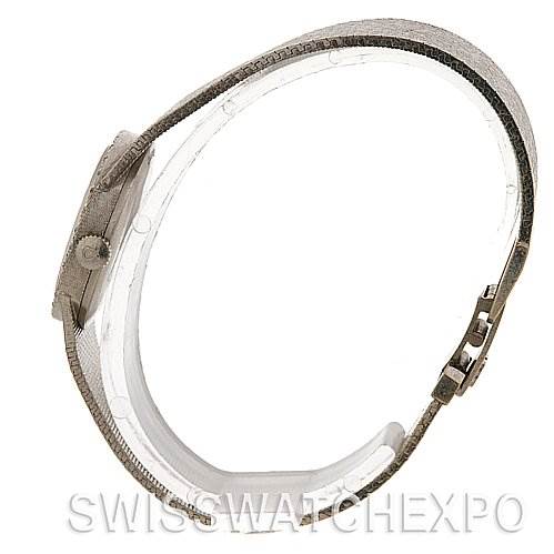 The image shows the side view of the Omega 7816 Women's White Gold Silver Dial 7816 Women's White Gold Silver Dial Vintage Ladies 14k White Gold Diamond Watch, highlighting the crown, case, and partial band.