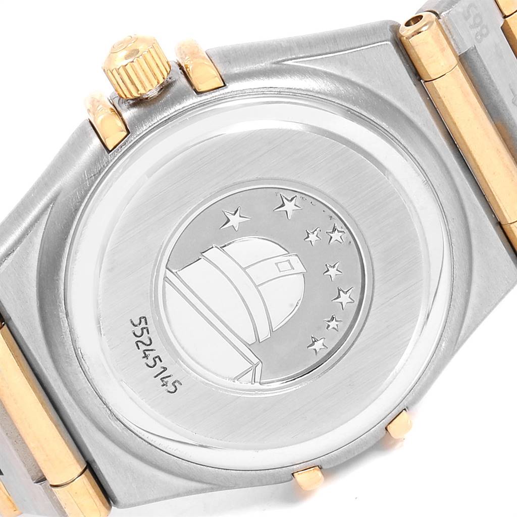 This image shows the case back and part of the bracelet of the Omega 1267.30.00 Women's Steel and Gold (two tone) Silver Dial 1267.30.00 Women's Steel and Gold (two tone) Silver Dial Constellation 95 Steel Yellow Gold Diamond Ladies Watch model 1267.30.00.