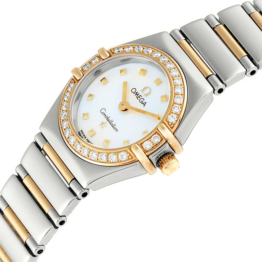 The Omega 1365.71.00 Women's Steel and Gold (two tone) Mother of Pearl Dial 1365.71.00 Women's Steel and Gold (two tone) Mother of Pearl Dial Constellation Steel Yellow Gold Diamond Ladies Watch 1365.71.00 is shown at an angled view, highlighting the dial, bezel, and bracelet.