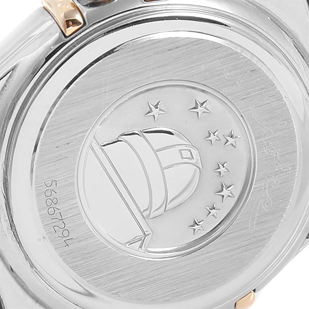 The image shows the back case of the Omega 1365.71.00 Women's Steel and Gold (two tone) Mother of Pearl Dial 1365.71.00 Women's Steel and Gold (two tone) Mother of Pearl Dial Constellation Steel Yellow Gold Diamond Ladies Watch 1365.71.00, featuring an embossed observatory design.