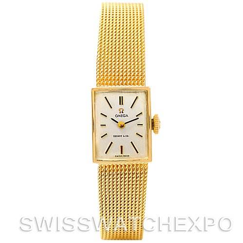 This image shows a front view of the Vintage Ladies 14k Yellow Gold Watch Made For Tiffany model by Omega Women's Yellow Gold Silver Dial Women's Yellow Gold Silver Dial, displaying its face and band.