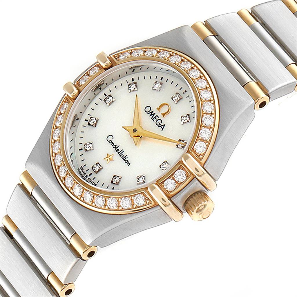 The Omega 1367.75.00 Women
s Steel and Gold (two tone) Mother of Pearl Dial 1367.75.00 Women
s Steel and Gold (two tone) Mother of Pearl Dial Constellation Steel Yellow Gold Diamond Ladies 1367.75.00 watch is shown at an angle highlighting the bezel, face, and bracelet.