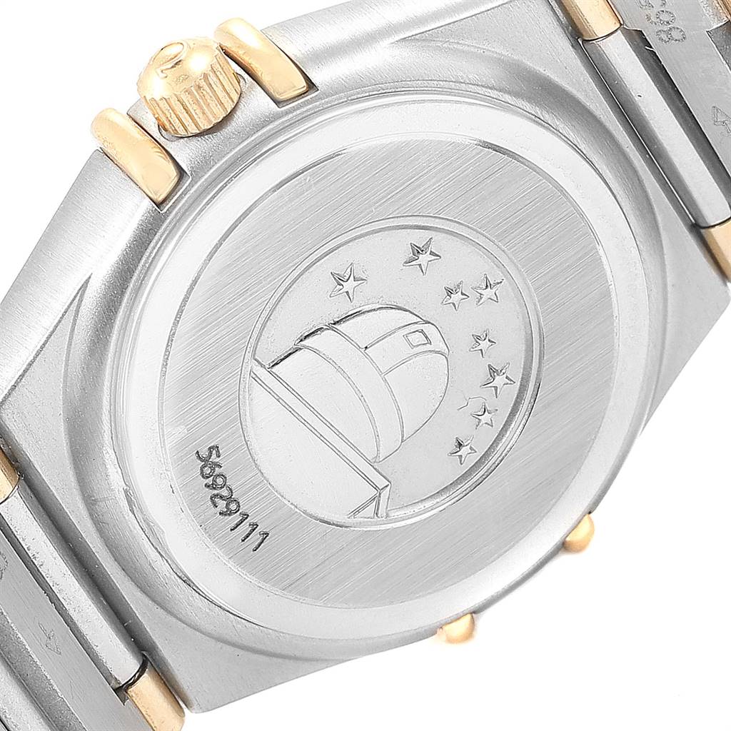 This image shows the case back and part of the bracelet of the Omega 1367.75.00 Women
s Steel and Gold (two tone) Mother of Pearl Dial 1367.75.00 Women
s Steel and Gold (two tone) Mother of Pearl Dial Constellation Steel Yellow Gold Diamond Ladies 1367.75.00 watch.