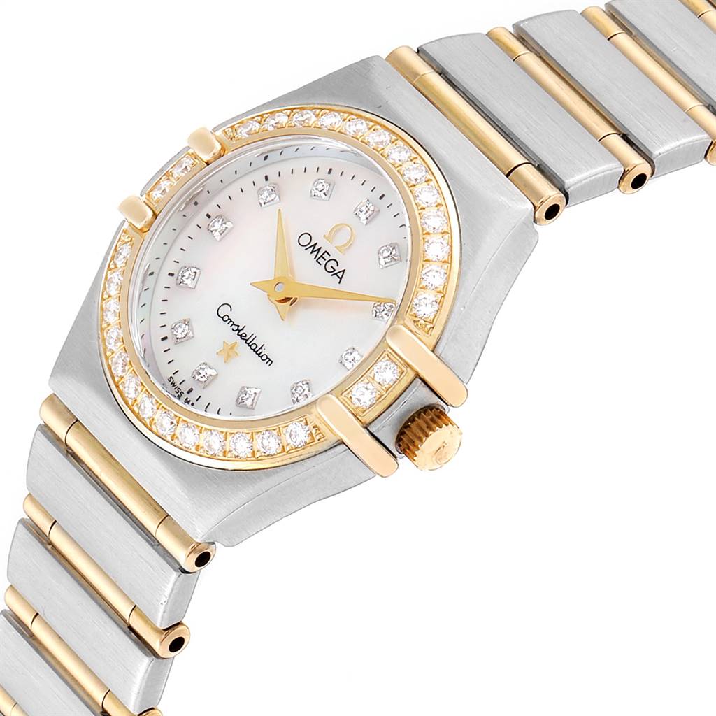 The image shows an Omega 1267.75.00 Women's Steel and Gold (two tone) Mother of Pearl Dial 1267.75.00 Women's Steel and Gold (two tone) Mother of Pearl Dial Constellation 95 Mother of Pearl Diamond Ladies Watch 1267.75.00 at a side angle, showcasing the dial, bezel, and part of the bracelet.