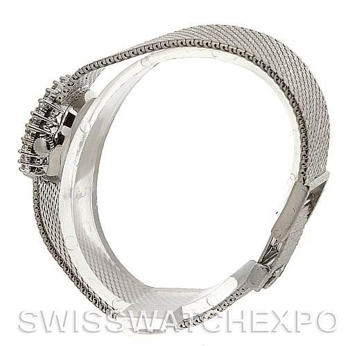 This is a side view of the Omega 8238 Women's White Gold Grey Dial 8238 Women's White Gold Grey Dial Deville Vintage Ladies 18k White Gold Diamond Watch, showing the bracelet and clasp.