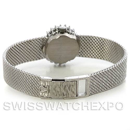 The image shows the back view of the Omega 8238 Women's White Gold Grey Dial 8238 Women's White Gold Grey Dial Deville Vintage Ladies 18k W Gold Diamond Watch, focusing on the clasp and mesh band.