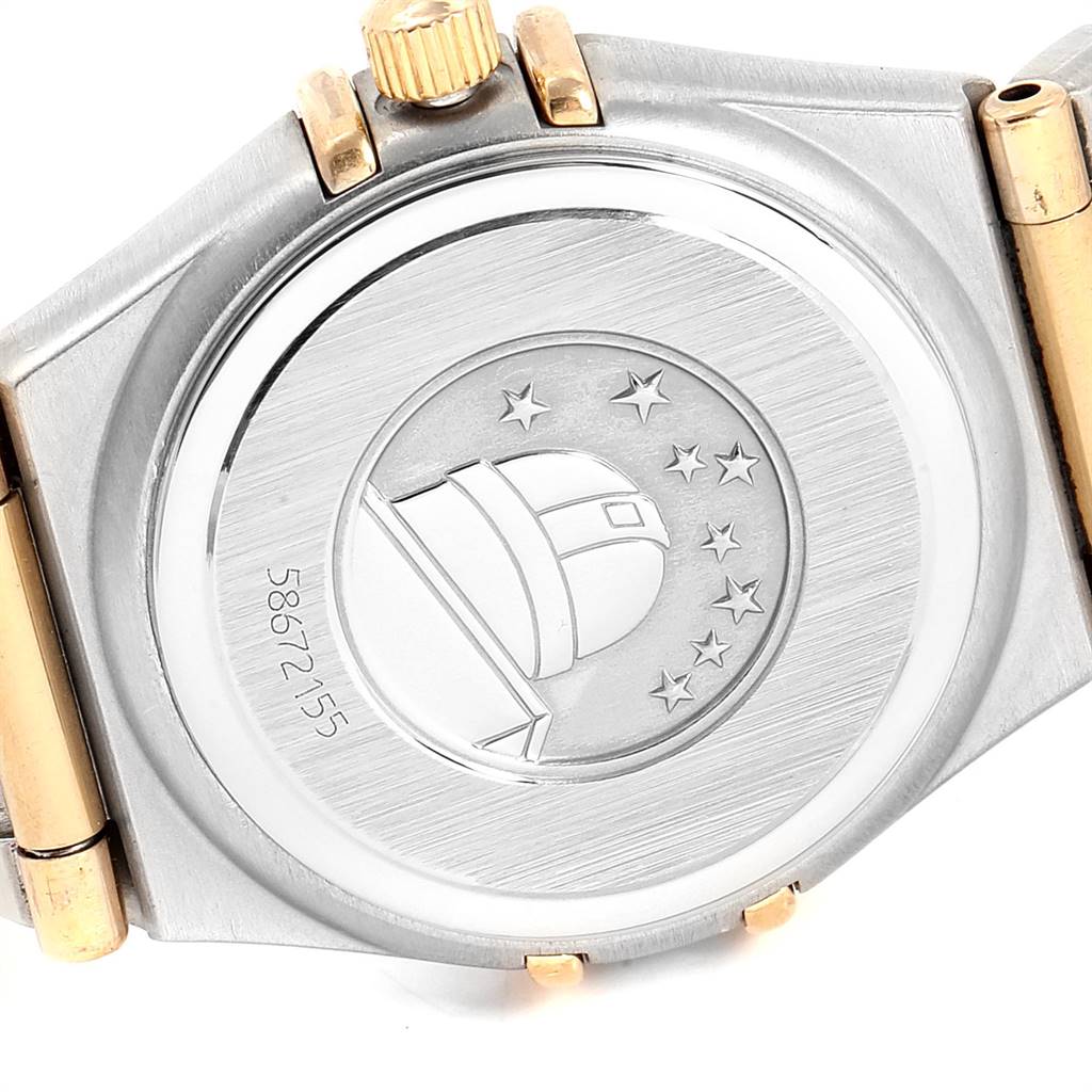 This image shows the case back and crown of the Omega 1267.75.00 Women's Steel and Gold (two tone) Mother of Pearl Dial 1267.75.00 Women's Steel and Gold (two tone) Mother of Pearl Dial Constellation MOP Diamond Ladies Watch 1267.75.00.