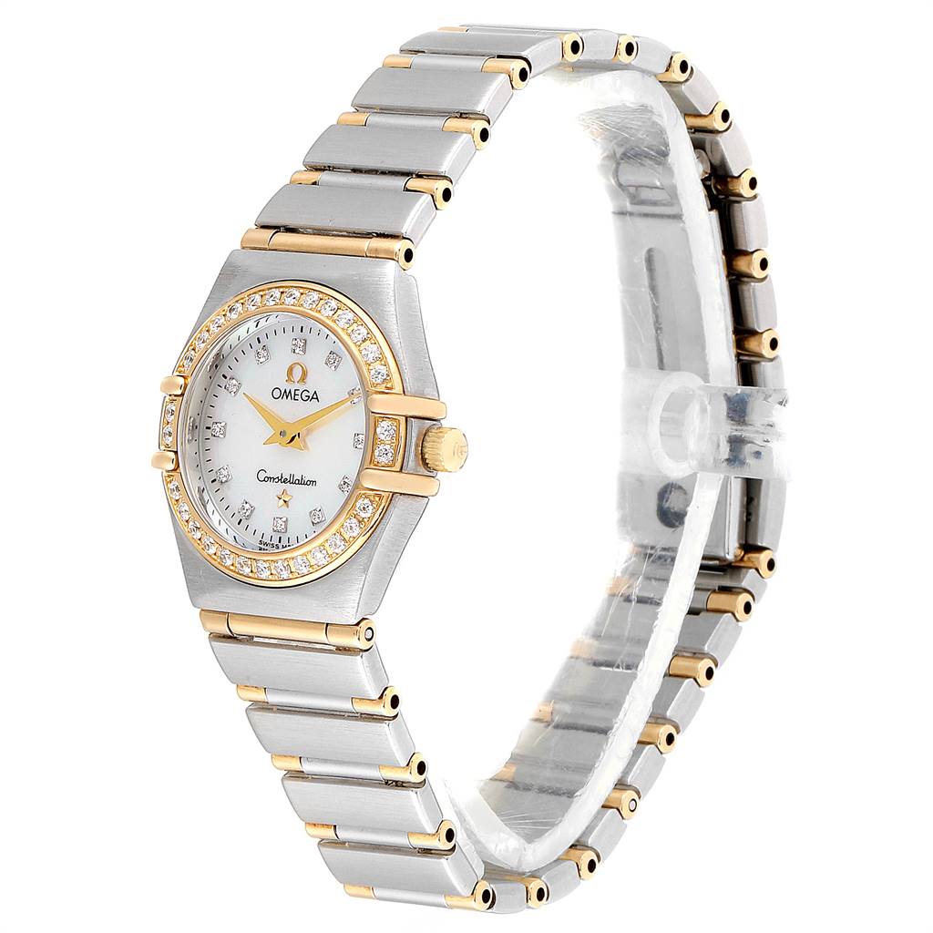 The Omega 1267.75.00 Women's Steel and Gold (two tone) Mother of Pearl Dial 1267.75.00 Women's Steel and Gold (two tone) Mother of Pearl Dial Constellation MOP Diamond Ladies Watch 1267.75.00 is shown at an angle displaying its face, bezel, bracelet, and crown.