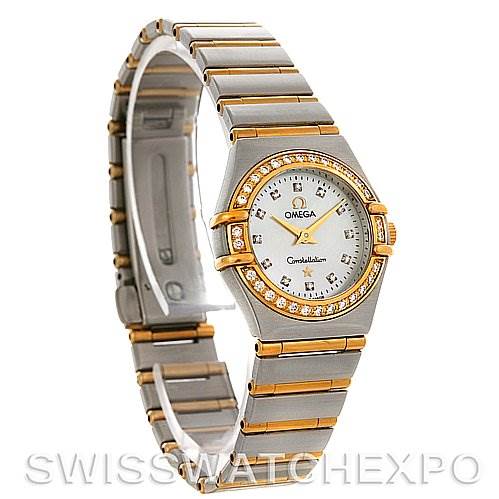 This image shows an angled view of the Omega 1365.75.00 Women
s Steel and Gold (two tone) Mother of Pearl Dial 1365.75.00 Women
s Steel and Gold (two tone) Mother of Pearl Dial Ladies Constellation Diamond Mini 1365.75.00 watch, highlighting its face, bezel, and bracelet.