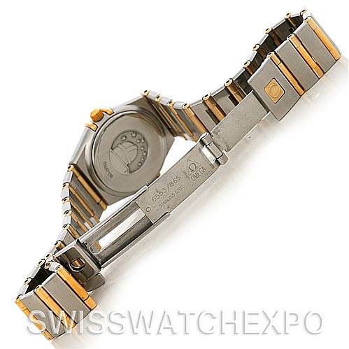 This Omega 1267.15.00 Women
s Steel and Gold (two tone) Champagne Dial 1267.15.00 Women
s Steel and Gold (two tone) Champagne Dial Constellation Mini Steel 18K Yellow Gold Diamond 1267.15.00 watch is shown from the back, displaying the clasp and bracelet.