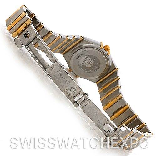 The image shows the back and open clasp of the Omega 1365.75.00 Women
s Steel and Gold (two tone) Mother of Pearl Dial 1365.75.00 Women
s Steel and Gold (two tone) Mother of Pearl Dial Constellation My Choice Steel Gold Diamond Mini 1365.75.00 watch.