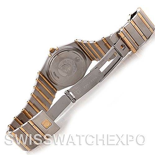 The angle shows the back and clasp of the Omega 1277.70.00 Women
s Steel and Gold (two tone) Mother of Pearl Dial 1277.70.00 Women
s Steel and Gold (two tone) Mother of Pearl Dial Constellation My Choice Steel Gold Diamond Watch 1277.70.00 model.