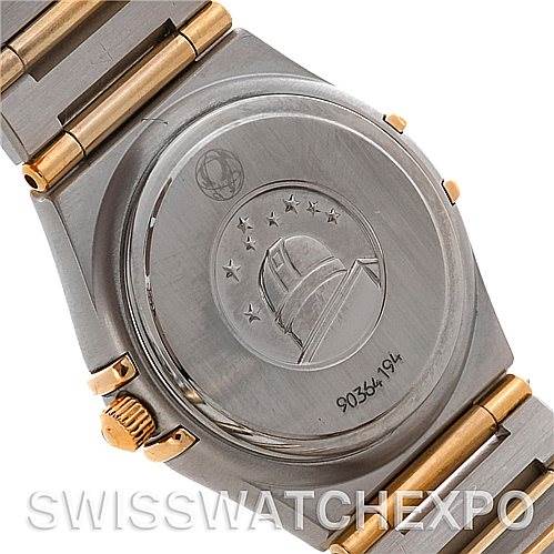 The image shows the back case and part of the bracelet of the Omega 1277.70.00 Women
s Steel and Gold (two tone) Mother of Pearl Dial 1277.70.00 Women
s Steel and Gold (two tone) Mother of Pearl Dial Constellation My Choice Steel Gold Diamond Watch 1277.70.00.