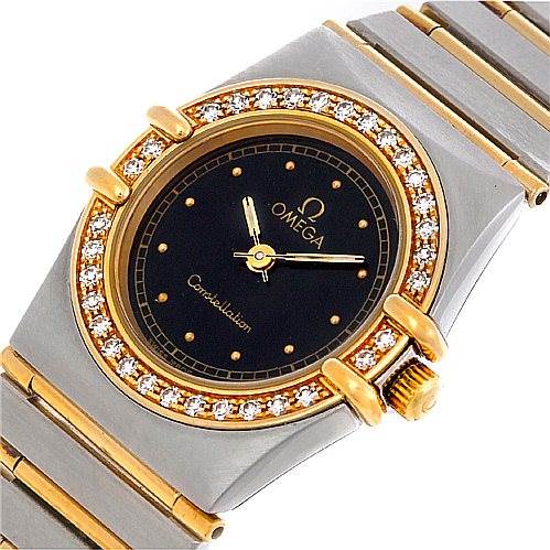 This image shows the face and bracelet of the Omega 1267.10.00 Women
s Steel and Gold (two tone) Black Dial 1267.10.00 Women
s Steel and Gold (two tone) Black Dial Constellation Diamond Mini 1267.10.00 Watch at a slight angle.