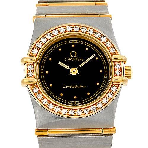 The image shows a front view of the Omega 1267.10.00 Women
s Steel and Gold (two tone) Black Dial 1267.10.00 Women
s Steel and Gold (two tone) Black Dial Constellation Diamond Mini 1267.10.00 watch, highlighting its diamond-studded bezel and black dial.