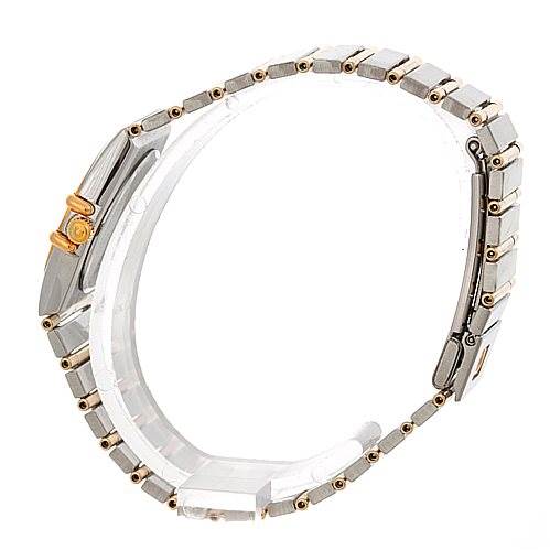 The image shows the side view of the band and clasp of an Omega 1267.10.00 Women
s Steel and Gold (two tone) Black Dial 1267.10.00 Women
s Steel and Gold (two tone) Black Dial Constellation Diamond Mini 1267.10.00 watch.