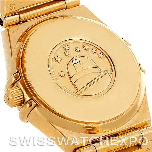 The image shows the case back of the Omega 1164.75.00 Women's Yellow Gold Mother of Pearl Dial 1164.75.00 Women's Yellow Gold Mother of Pearl Dial Constellation 18K Yellow Gold Diamond Mini 1164.75.00 Watch, featuring an observatory engraving.